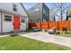 Lush backyard featuring a modern patio setup, well-kept lawn, and privacy fencing at 358 Terrace Ave, Indianapolis, IN 46225