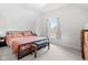 Cozy bedroom with a comfortable bed, natural light, and carpet, offering a tranquil retreat at 358 Terrace Ave, Indianapolis, IN 46225