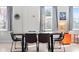 Bright dining room with multiple windows and modern decor, perfect for Gathering meals and entertaining guests at 358 Terrace Ave, Indianapolis, IN 46225