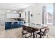 Open concept dining area, featuring the kitchen island, that is perfect for modern living at 358 Terrace Ave, Indianapolis, IN 46225