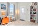 Bright entryway with stylish decor, featuring a window with natural light, and modern light fixtures at 358 Terrace Ave, Indianapolis, IN 46225