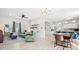 Open-concept living room with modern furniture and decor, seamlessly flowing into the kitchen at 358 Terrace Ave, Indianapolis, IN 46225