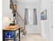 Hallway with a view of the staircase, natural light, and tasteful decor, seamlessly integrated with the home's design at 358 Terrace Ave, Indianapolis, IN 46225