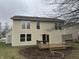 Exterior view of home showing siding, windows, and wooden deck in backyard at 3734 Ontario Cir, Indianapolis, IN 46268