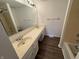 Bathroom with a double sink vanity and ample storage at 3734 Ontario Cir, Indianapolis, IN 46268