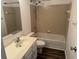 A bathroom is well-equipped with a bathtub, shower, sink, and toilet, and is brightly lit at 3734 Ontario Cir, Indianapolis, IN 46268