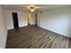 Spacious bedroom with fan, neutral walls, and modern flooring at 3734 Ontario Cir, Indianapolis, IN 46268
