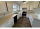 Bright kitchen featuring modern appliances, double sink and generous counter space at 3734 Ontario Cir, Indianapolis, IN 46268