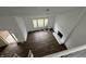 The living room features hardwood floors, a fire place, and windows looking to the outside, high ceilings at 3734 Ontario Cir, Indianapolis, IN 46268