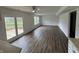 Living space featuring wood floors and a view of the back deck through French doors at 3734 Ontario Cir, Indianapolis, IN 46268