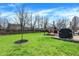 Lush backyard features a paver patio, manicured lawn, and space for outdoor activities and relaxation at 4345 Elkhorn Dr, Westfield, IN 46062