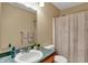 Bathroom featuring vanity with sink, mirror, and shower-tub combo at 4345 Elkhorn Dr, Westfield, IN 46062