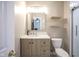 Well-lit bathroom featuring a vanity with marble countertop and a glass enclosed shower at 4345 Elkhorn Dr, Westfield, IN 46062