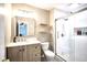 Bright bathroom features a glass shower, modern vanity, and floating shelves at 4345 Elkhorn Dr, Westfield, IN 46062