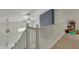 Upstairs hallway with view down to first floor and play area at 4345 Elkhorn Dr, Westfield, IN 46062