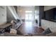 Comfortable living room with fireplace, stylish decor, and abundant natural light at 4345 Elkhorn Dr, Westfield, IN 46062
