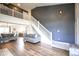 Bright living room with open floor plan and staircase leading to the second level at 4345 Elkhorn Dr, Westfield, IN 46062