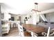 Inviting living space showcasing an open floor plan with kitchen, dining, and living areas at 4345 Elkhorn Dr, Westfield, IN 46062