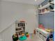 Upstairs open play area with carpet, shelving and toys at 4345 Elkhorn Dr, Westfield, IN 46062