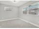 This empty bedroom features two windows at 4601 N Ball Ave, Muncie, IN 47304