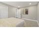 This bedroom has carpet, a closet and open doorway to another room at 4601 N Ball Ave, Muncie, IN 47304