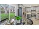 Modern kitchen featuring stainless steel appliances and view to the backyard at 4601 N Ball Ave, Muncie, IN 47304