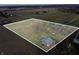 Aerial view of property showcasing large lot with home and a red barn with clear boundary lines at 4611 E Us Highway 36, Markleville, IN 46056