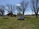 Well-maintained yard with accessory outbuilding and plenty of space for recreation at 4611 E Us Highway 36, Markleville, IN 46056