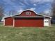 Red barn with a gray roof and white trim at 4611 E Us Highway 36, Markleville, IN 46056