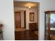 Hallway displaying detailed woodwork and storage, offering a glimpse into the home's classic design at 4611 E Us Highway 36, Markleville, IN 46056