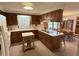 Kitchen featuring wood cabinets and an island at 4611 E Us Highway 36, Markleville, IN 46056