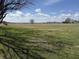Expansive open lot with mature tree and clear blue skies and a potential homesite at 4611 E Us Highway 36, Markleville, IN 46056