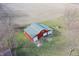 Aerial view of new outbuilding or detached garage with ample parking at 4611 E Us Highway 36, Markleville, IN 46056