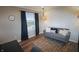 Cozy office space with stylish wallpaper, a modern sofa, and a large window for ample natural light at 4733 Mecklenburg Dr, Plainfield, IN 46168