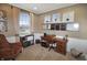 Comfortable home office with a wood desk, organized shelving, and natural light at 4733 Mecklenburg Dr, Plainfield, IN 46168