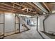 Exposed basement with stairs at 4906 S State Ave, Indianapolis, IN 46227