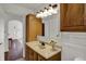 Classic bathroom with a vanity, ample lighting, and storage, offering a functional and inviting space at 4906 S State Ave, Indianapolis, IN 46227