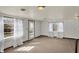 A bright living room with multiple windows at 4906 S State Ave, Indianapolis, IN 46227
