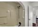 Updated shower with safety features, including grab bars, and a classic design with beadboard detailing at 4906 S State Ave, Indianapolis, IN 46227