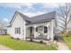 Charming home with a cozy front porch, decorative trim, and a well-maintained lawn at 508 Mount St, Greenfield, IN 46140