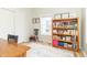 Office space with a bookcase and natural light from the window at 508 Mount St, Greenfield, IN 46140