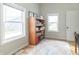 Bright office space featuring large windows, a bookcase, and neutral decor at 508 Mount St, Greenfield, IN 46140