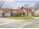 Charming single-story home with a brick facade, well-kept lawn, and attached garage at 5417 Kerns Ln, Indianapolis, IN 46268