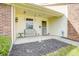Inviting front porch with bench seating and decorative touches, creating a welcoming entrance at 5417 Kerns Ln, Indianapolis, IN 46268