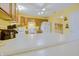 Bright kitchen boasting a breakfast bar, white countertop, and modern appliances, perfect for cooking and entertaining at 5417 Kerns Ln, Indianapolis, IN 46268