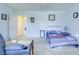 Well-lit main bedroom with a comfortable sitting area and ample natural light, creating a relaxing retreat at 5417 Kerns Ln, Indianapolis, IN 46268