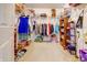 Large walk-in closet with ample storage, shelving, and space to organize wardrobe and accessories at 5417 Kerns Ln, Indianapolis, IN 46268