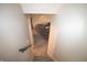 Stairway leading to a finished basement, offering extra living space and potential for customization at 5707 W Mills Rd, Indianapolis, IN 46221