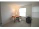 Well-lit room with a window, perfect for a bedroom or home office setup at 5707 W Mills Rd, Indianapolis, IN 46221