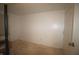 Bright, carpeted bedroom with fresh paint, a bright window and ample space for comfortable living at 5707 W Mills Rd, Indianapolis, IN 46221
